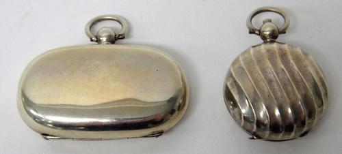 A silver twin compartment sovereign and half sovereign case, the exterior plain, Chester 1902 and a Victorian silver single compartment sovereign case
