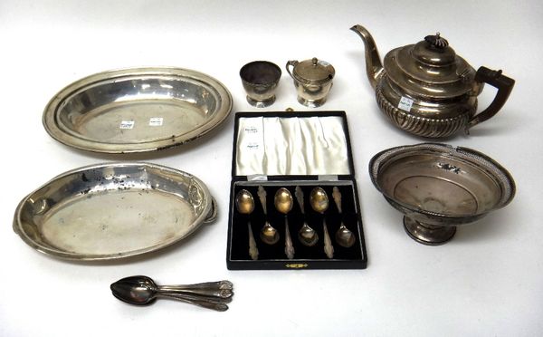 Silver, comprising; a set of six coffee spoons, Sheffield 1963 and 1964, cased, a three piece condiment set, comprising; a mustard pot, a salt and a p