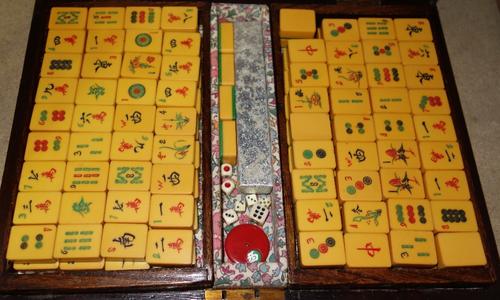 A Mah-Jong set in a mahogany box and another. (2)  S2M