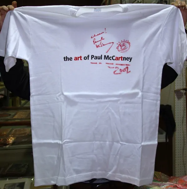 A signed Rolling Stones 1999 tour T Shirt together with a signed Paul McCarthy T shirt. (2)All potential purchasers should satisfy themselves with aut