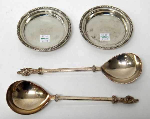 A pair of silver circular dishes, each initial engraved and having a gadrooned rim, Birmingham 1965, combined weight 120 gms and a pair of plated serv