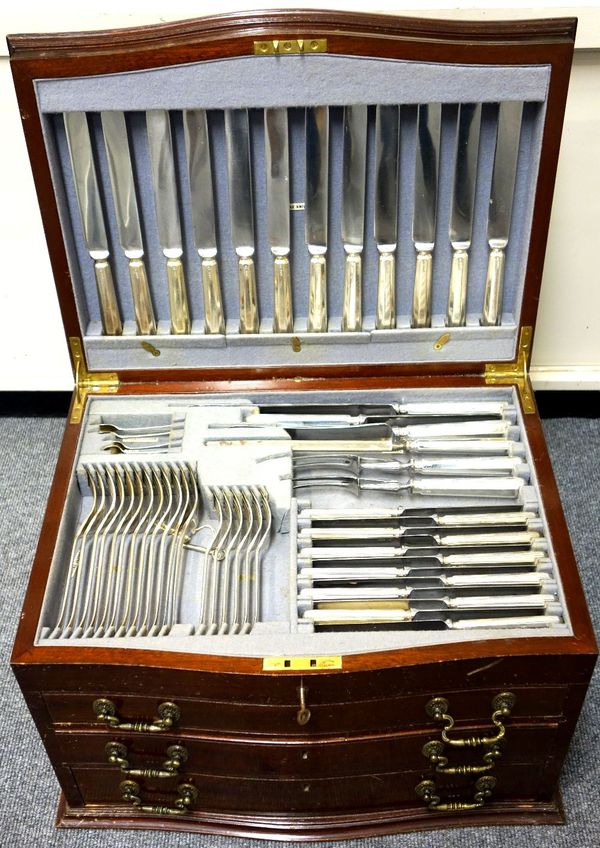 A George V silver canteen of flatware for twelve persons in the Old English pattern, comprising; twelve table knives, twelve table forks, twelve desse