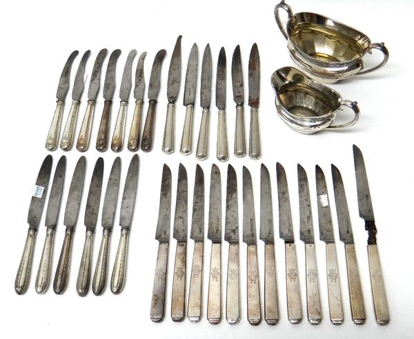 Six silver handled knives, with steel blades, the handles with beaded and banded decoration, Sheffield last quarter of the 18th century, seven knives