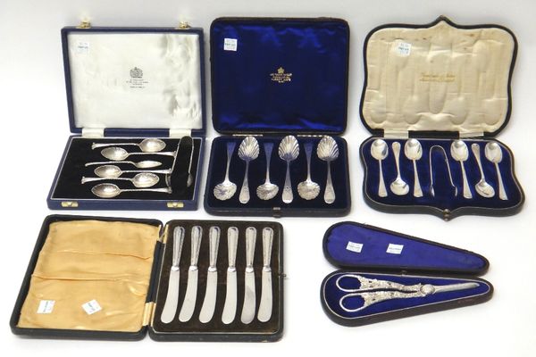 Silver, comprising; a set of six coffee spoons, with shell shaped bowls, London 1903, a pair of sugar tongs, Birmingham 1903, six similar large teaspo