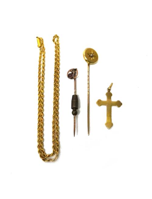 A gold neckchain, in a multiple link design, detailed 15, on a cylindrical clasp, weight 8.7 gms, a gold and half pearl set stick pin, a seed pearl an