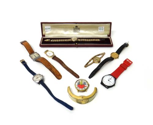 A lady's 9ct gold circular cased Omega wristwatch, on an associated 9ct gold bracelet, with a foldover clasp, with spare links and with a case, a lady