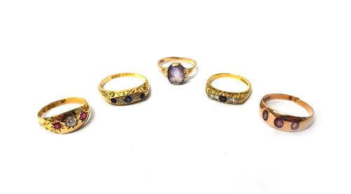 An 18ct gold, sapphire and diamond set five stone ring, Birmingham 1923, an 18ct gold, sapphire and diamond set five stone ring, mounted with the circ