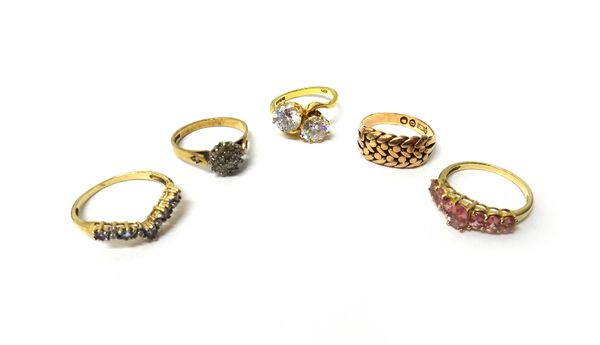 A late Victorian 9ct gold ring in an interwoven design, London 1898, a 9ct gold and diamond set cluster ring, an 18ct gold and colourless gem set two