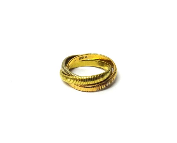 A Cartier three colour gold triple band Russian style wedding ring, with milled decoration, detailed Cartier 18 K, ring size H, weight 6.7 gms.