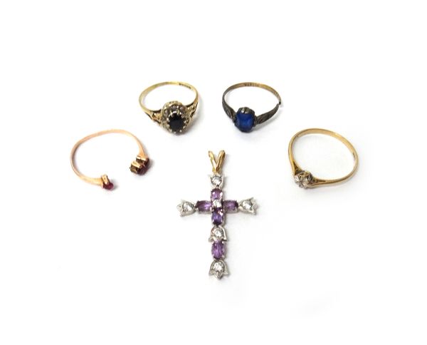 A 9ct gold, sapphire and diamond oval cluster ring, a 9ct gold and diamond solitaire ring, two further rings and a 9ct gold, amethyst and colourless g