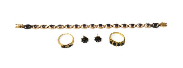 A gold and sapphire bracelet, in an oval openwork link design, claw set with circular cut sapphires, on a snap clasp, length 18.5cm, an 18ct gold ring