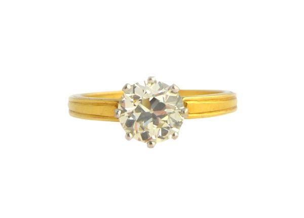 A gold and diamond single stone ring, claw set with a cushion shaped diamond, the diamond weighs approx 1.40 cts, ring size O.  Illustrated