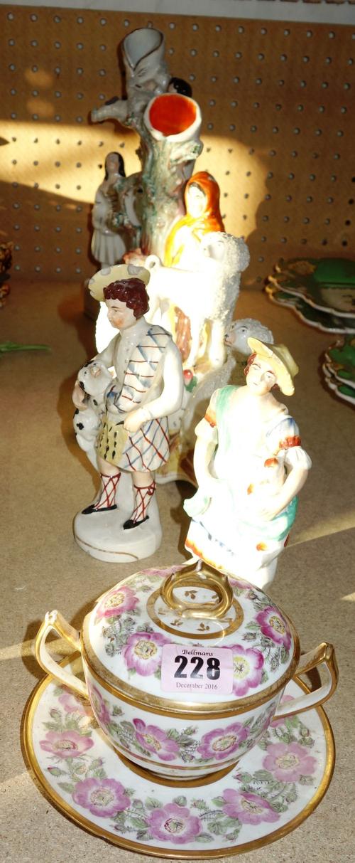 A quantity of Staffordshire flat back figures and a floral decorated cup and cover. S1M