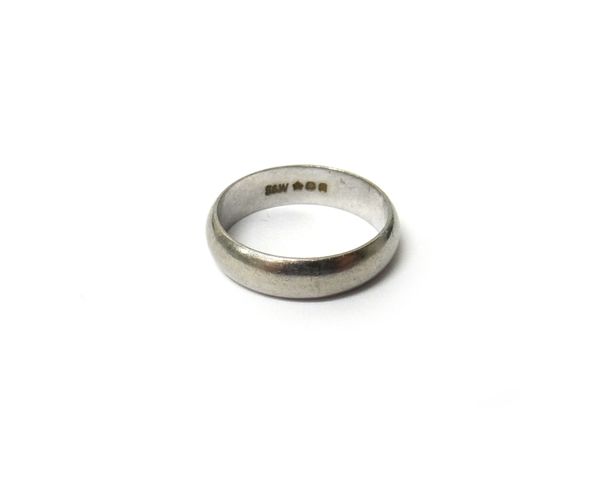 A platinum plain wedding ring, ring size N and a half, weight 6.5 gms, with a case.