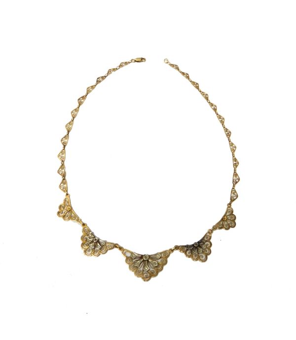 A French gold and rose diamond set necklace, in a filigree and graduated fanned design, with a later gold sprung hook shaped clasp, with a case, gross