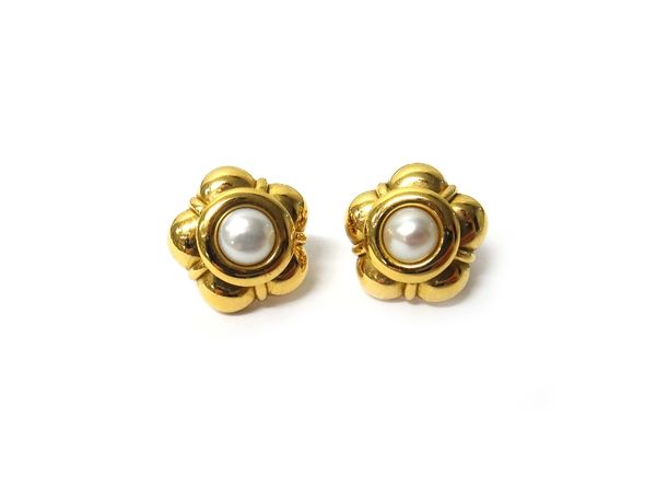 A pair of 18ct gold and cultured pearl earclips, each designed as a cinquefoil, the backs with post and sprung clip fittings, detailed AJA, with a Bir