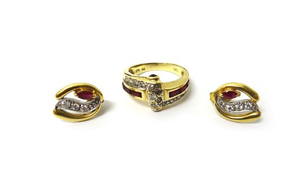 A gold, red and colourless gem set ring, in a twist design, detailed 585, ring size N and a half and a pair of gold, marquise shaped ruby and colourle