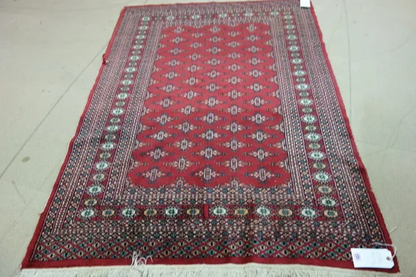 A Pakistan Bokhara rug, 180cm x 128cm.  3.1  GAL