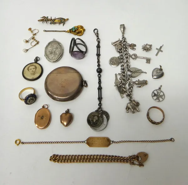 A silver circular vesta case, Birmingham 1905, a silver curb link charm bracelet, three rings, a gold curb link bracelet, with a gold heart shaped pad