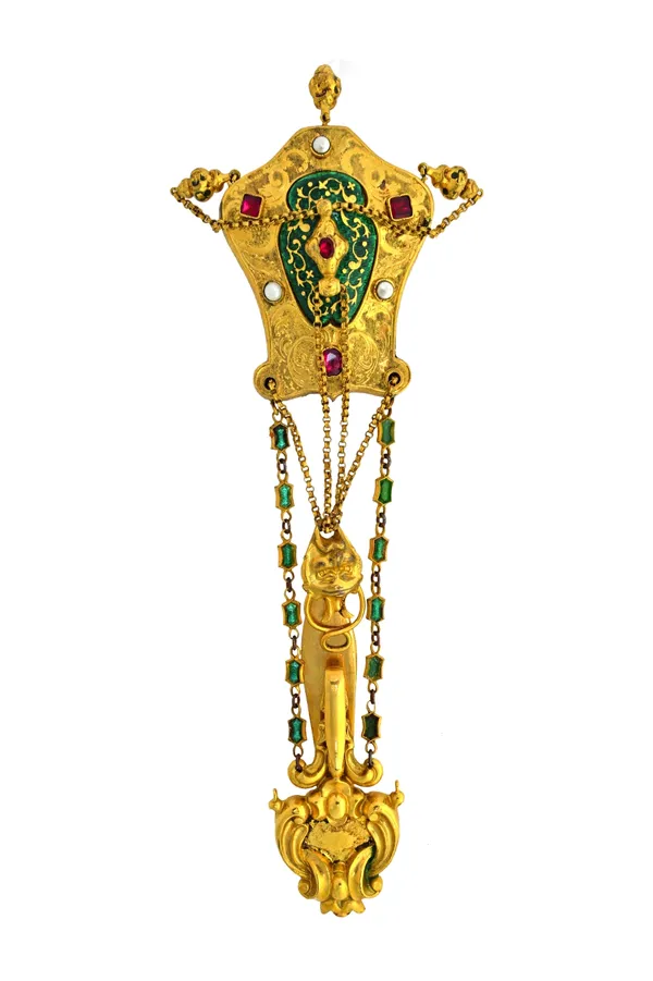 A gilt metal, imitation pearl and foil backed red gem set and green enamelled chatelaine clip, fitted with a folding purse connected by chains, the fr