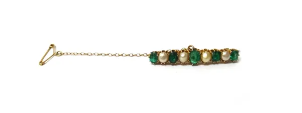 A gold, emerald and cultured pearl brooch, mounted with a row of five cushion shaped emeralds, alternating with four cultured pearls, fitted with a sa