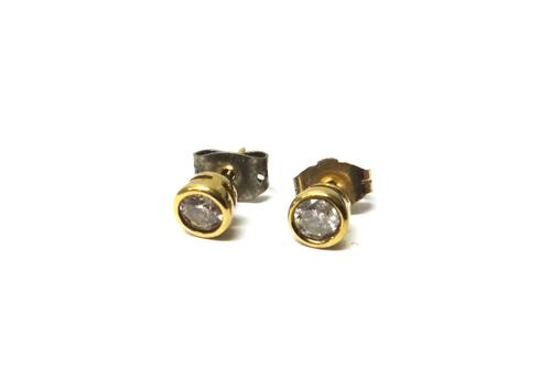 A pair of 9ct gold and diamond set single stone earstuds, each collet set with a circular cut diamond, the backs with post fittings.