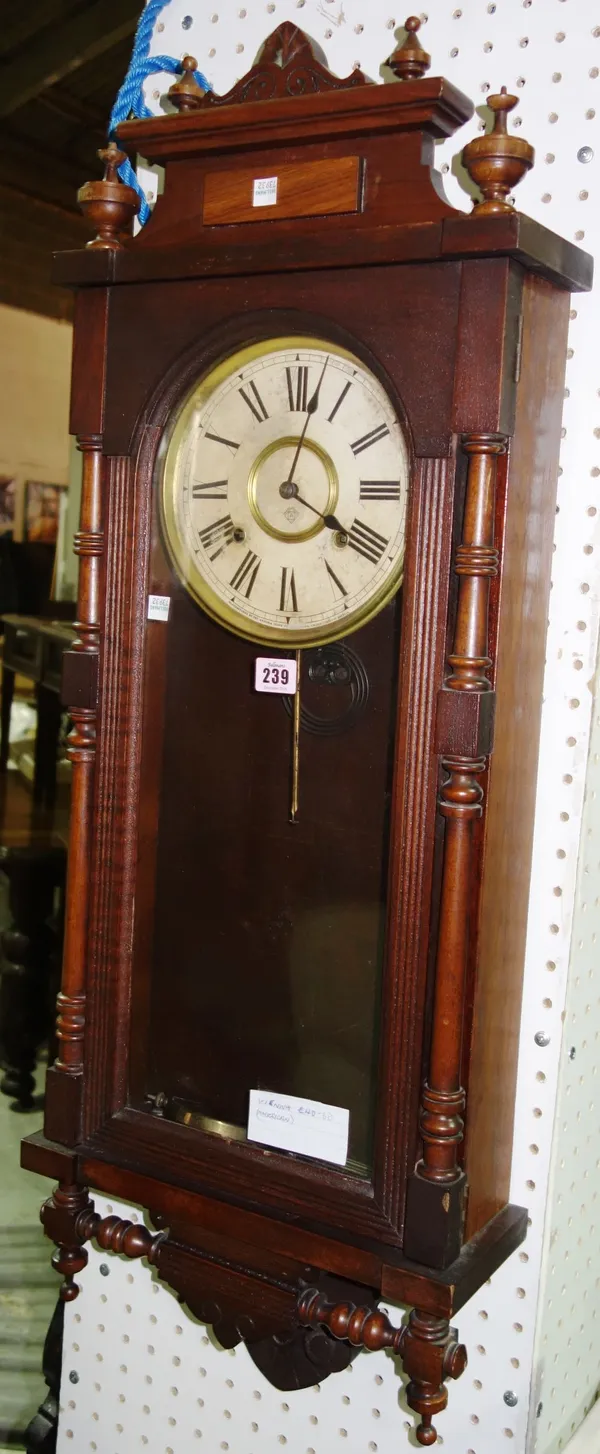 A mahogany cased Vienna style wall clock.    D6