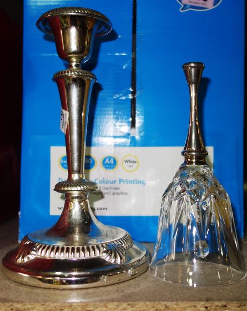 A quantiy of silver plate including candlesticks, cigarette box and sundry. (qty)  S1T