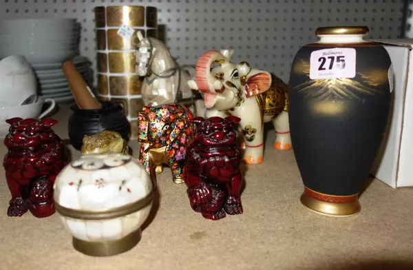 A group of collectables including a faux gemstone inlaid chillum, a pair of cinnabar type dogs, elephant models and sundry. (qty)  S3T