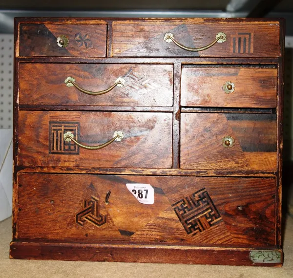 An oriental specimen wood table chest.  S3T