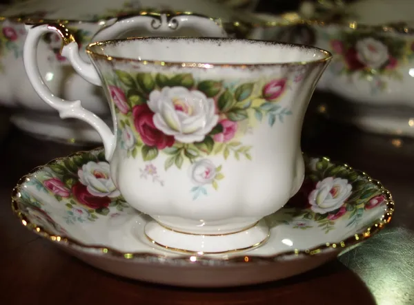 A Royal Albert floral and gilt part dinner and tea service.   G7