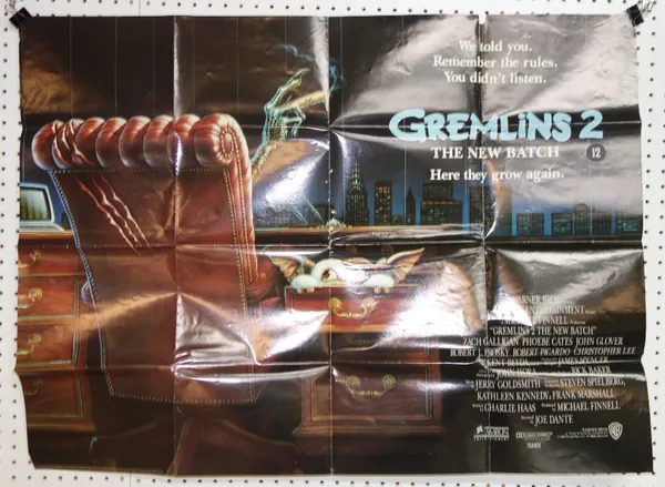 Film posters' 'Gremlins' & Gremlins 2' with a group of lobby cards.