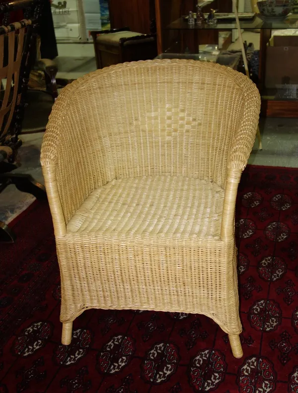 A Lloyd loom style tub chair and a mahogany upholstered tub chair. (2)  J8