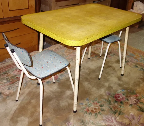 A 20th century yellow Formica table and two metal chairs. (3)  DIS