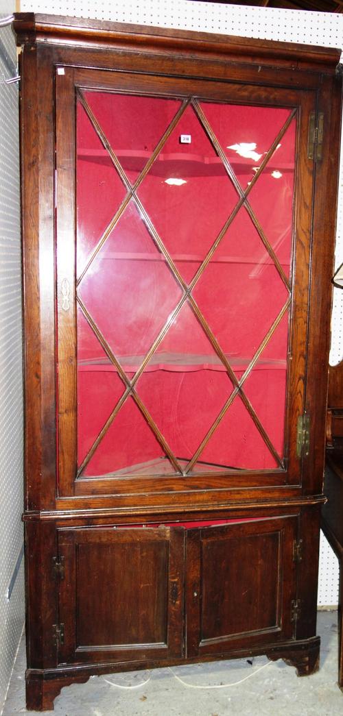 A George III oak floor standing corner display cabinet/cupboard on bracket feet, 105cm wide x 220cm high. M4Property from the estates of the late Adri