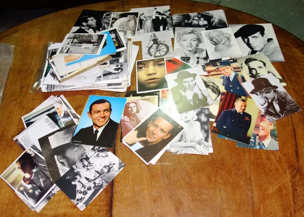 A large quantity of various TV & film related still photos and postcards.  CAB