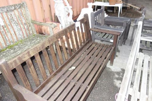 A teak garden bench and two tables. (3)  OUT