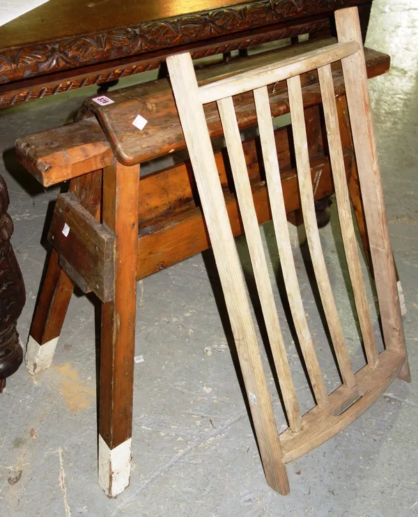 A 20th century pine saddle stand and a slatted pine tray. (2)  F7