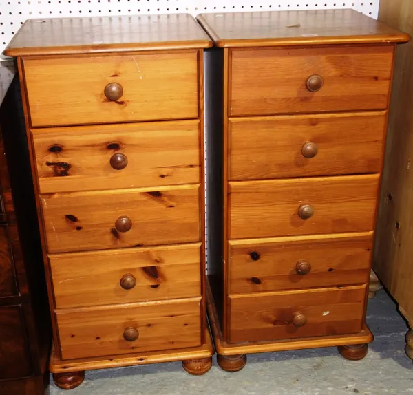 A pair of 20th century pine chests of five drawers, 44 cm. (2)  C1
