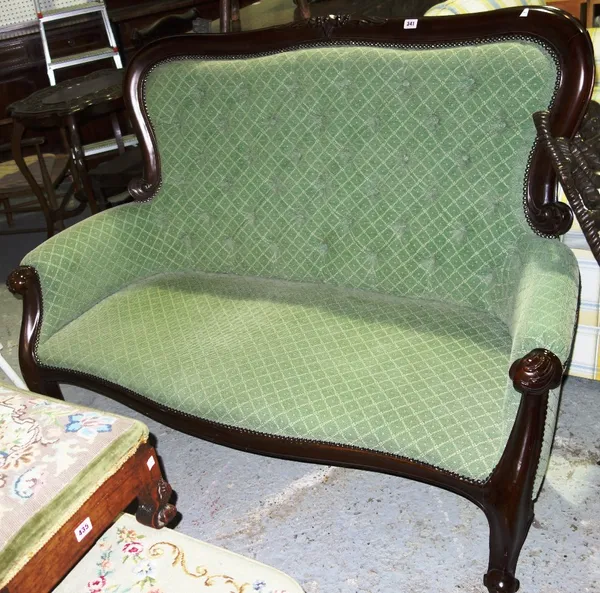 A 20th century mahogany framed green upholstered sofa.   H3