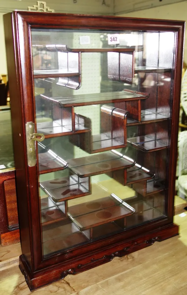 A 20th century Oriental wall mounted display case. D5