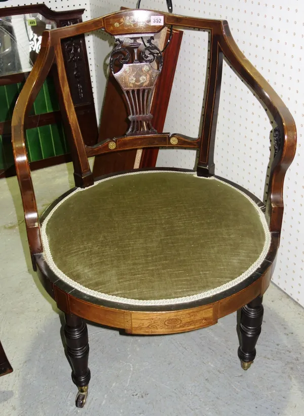 An Edwardian mahogany and inlaid nursing chair.  GAL