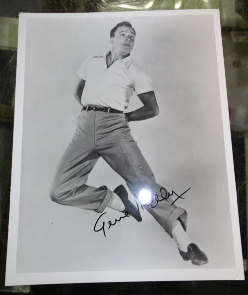 A signed photo of Gene Kelly. All potential purchasers should satisfy themselves with authenticity of signatures.  CAB