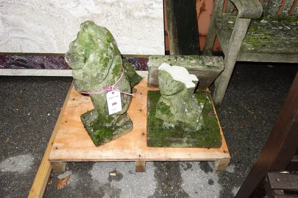A pair of reconstituted stone figures of lions. (a.f) (2)  OUT