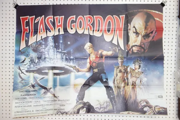 Film poster 'Flash Gordon' together with a group of lobby cards.