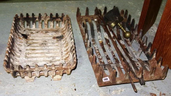 Two cast iron fire grates and a quantity of fire tools. (qty)   E4