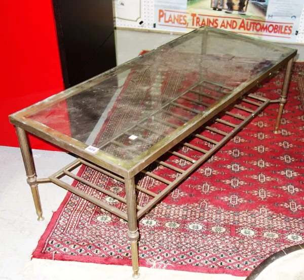 A 19th century brass and glass coffee table, 107cm wide.   GAL