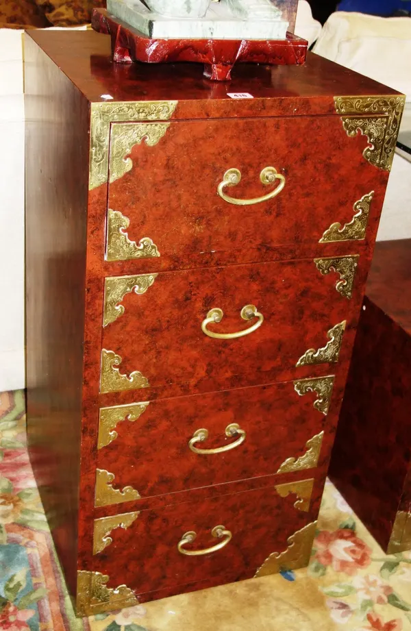 A 20th century Korean engraved brass red lacquered chest of four small drawers, 46cm wide.  DIS