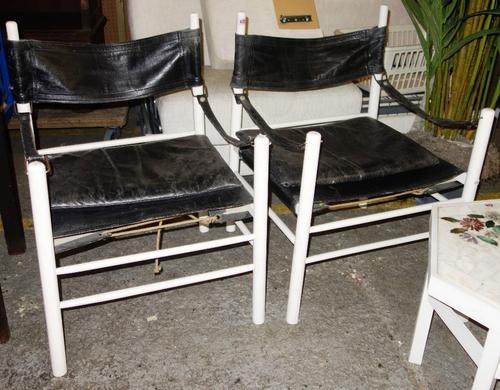 A pair of leather mounted later white painted armchairs in the manner of Arne Norell (2).  G8Provenance; The Estate of Fleur Cowles