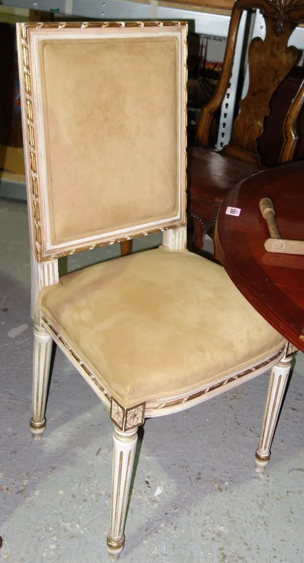 A pair of Louis XVI style parcel gilt cream painted square back side chairs (2).   L8